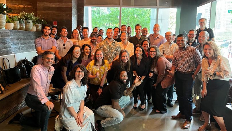 BlueConic’s team poses for a photo at an event.
