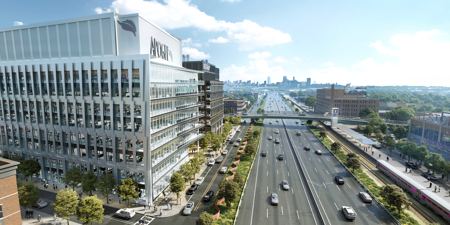 A rendering of the 176 Lincoln development on the north side of I-90 with downtown Boston pictured in the distance.