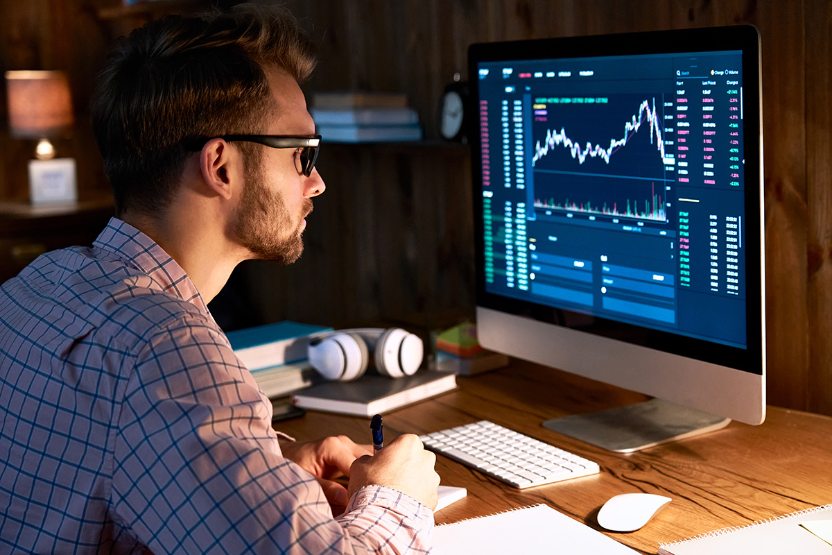 Businessman looking at a computer monitor