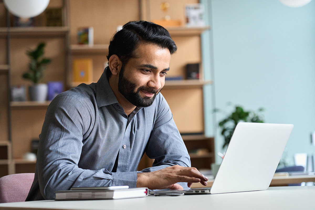 Business man working on laptop at home office