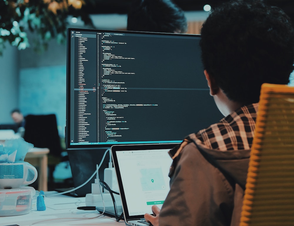 A software developer writing code