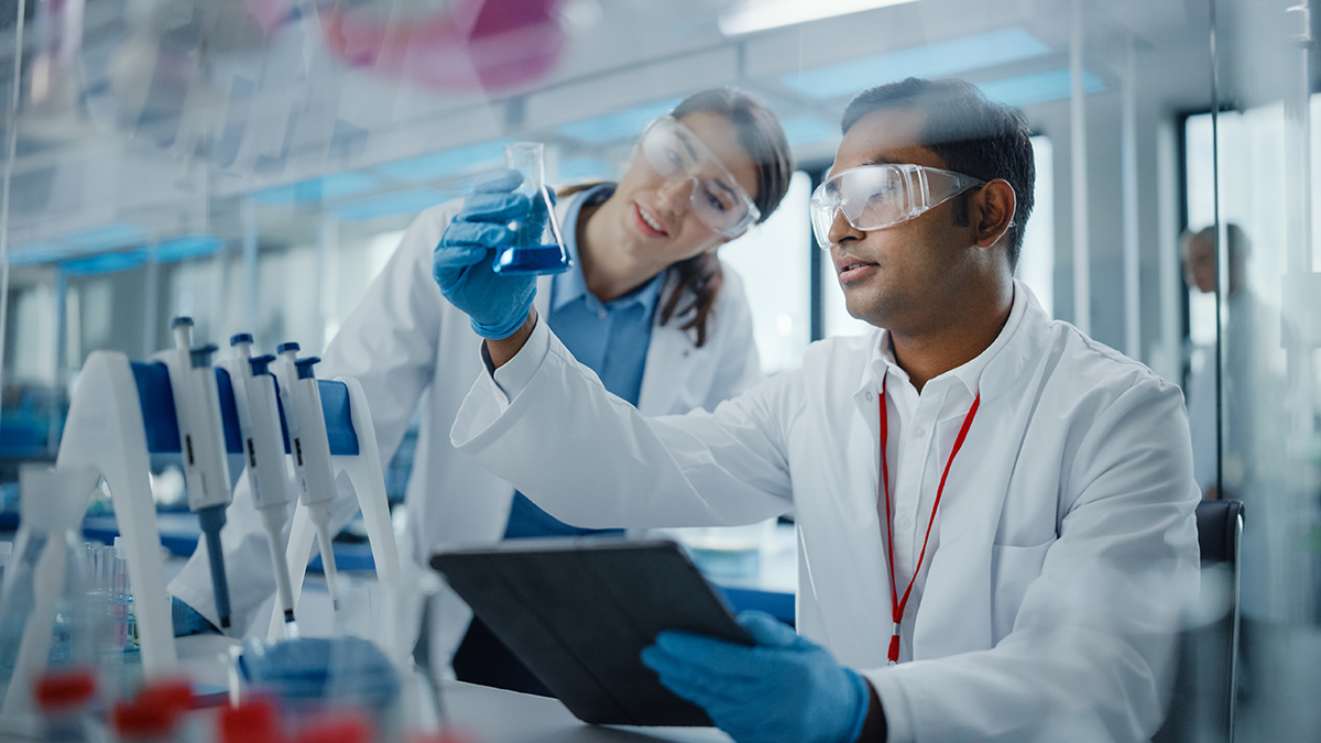 two scientists working together in a lab