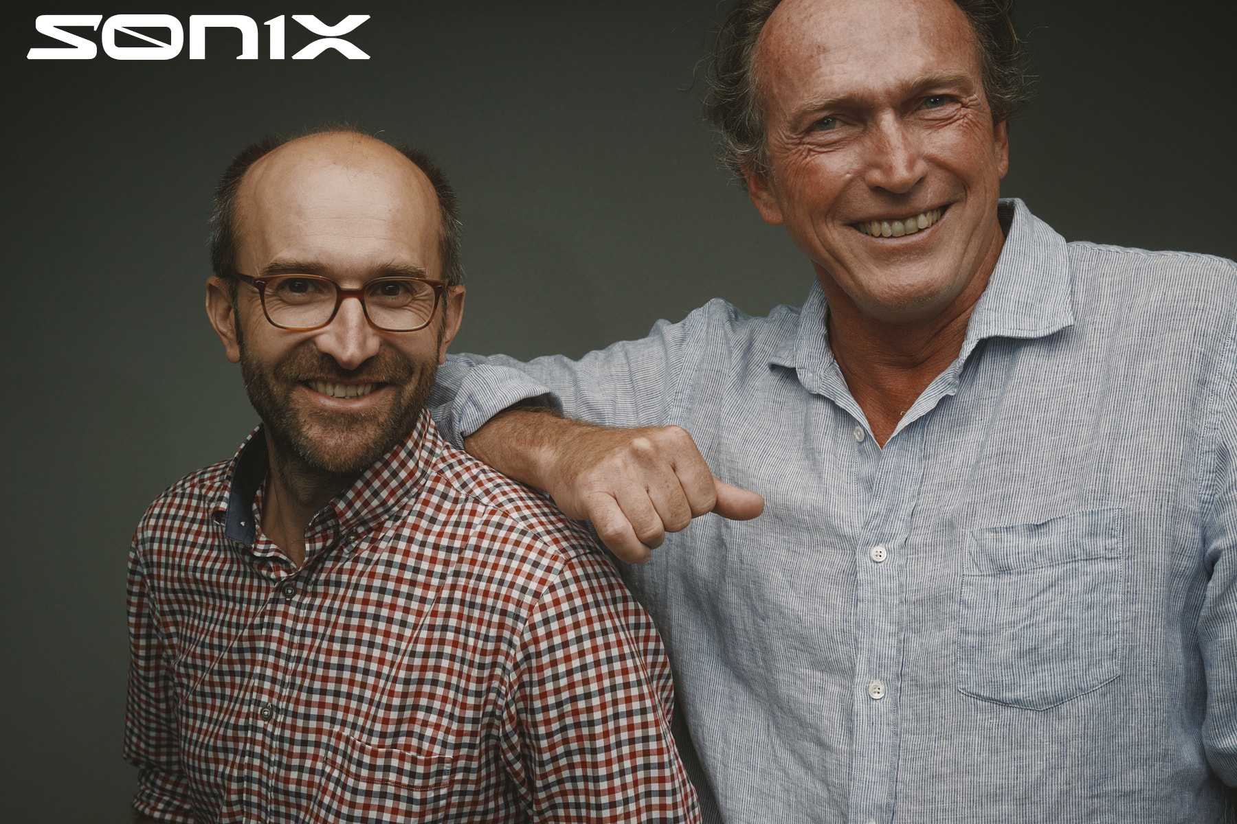 SONIX's co-founders pose together for a photo.
