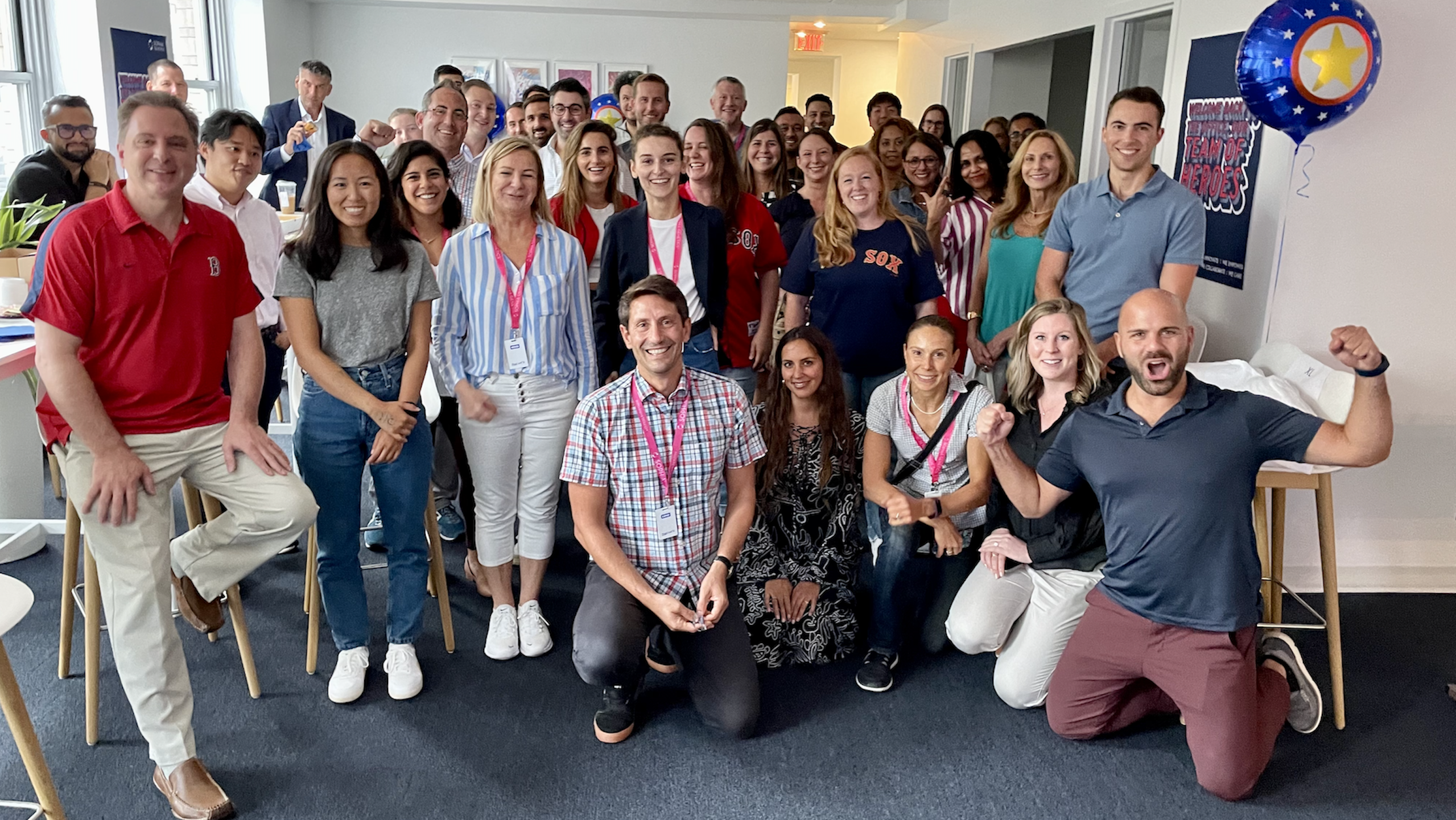 The SOPHiA GENETICS team poses for a company picture.