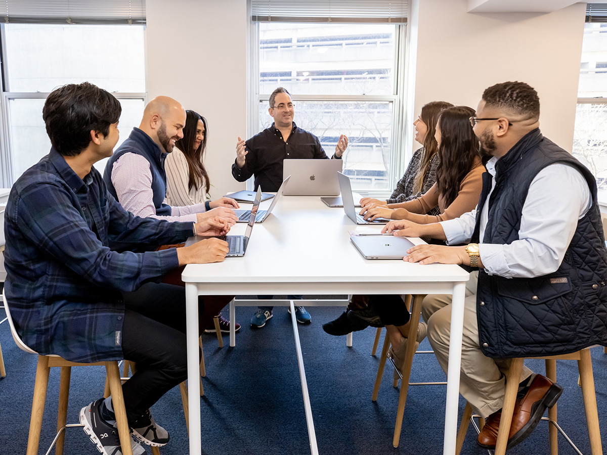 Sophia Genetics colleagues having a team huddle