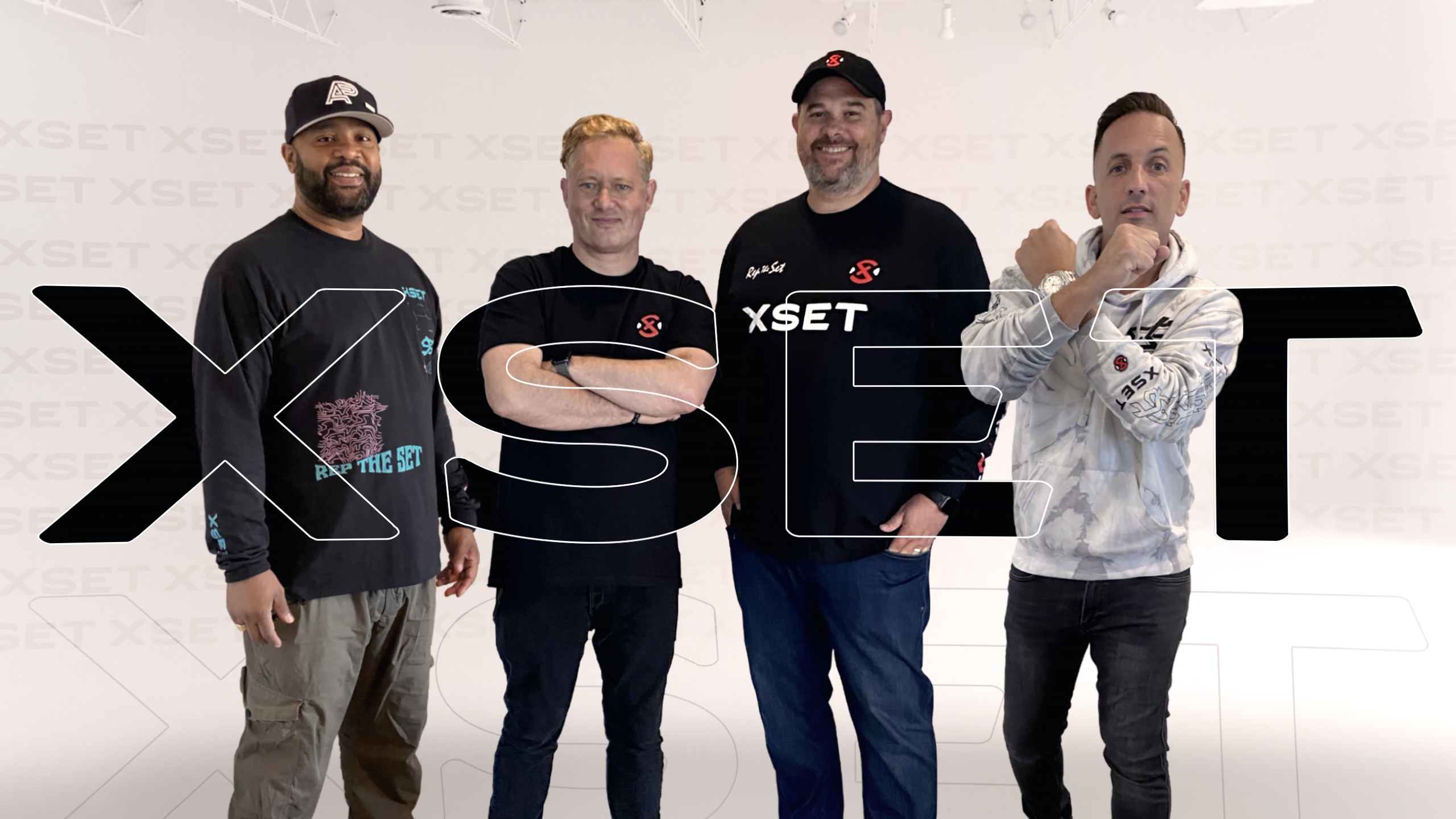 XSET founders making an x with their hands standing side by side