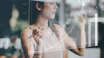 A woman analyzing trend statistics