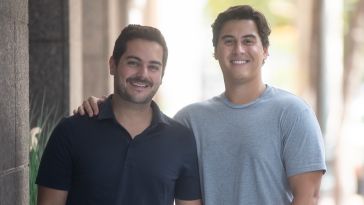 Relevize co-founders Michael Nardella and Peter Sidney stand outside a building