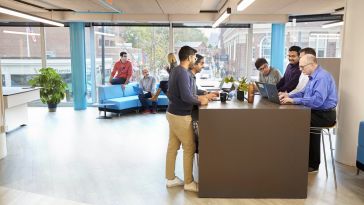 A group of Kensho employees work in their Cambridge, MA, headquarters