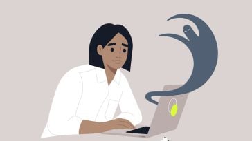 drawing of person working on laptop with ghost coming out