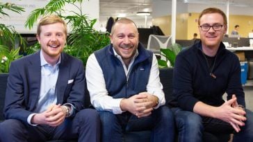 Monitaur was co-founded by CTO Andrew Clark (left), CEO Anthony Habayeb (middle) and lead engineer Michael Herman (right). They are pictured sitting on a couch in an office.