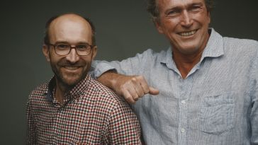 SONIX’s co-founders pose together for a photo.