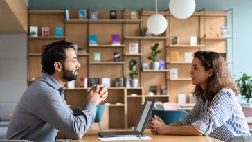 Empathetic manager listens to employee