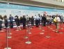 Attendees line up to register for an event