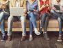 People consuming media on phones, tablets and laptops. 
