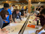 Cohere Health team members work on a group puzzle. 